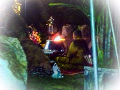 Kroo Ba Krissana Intawano blessing amulets inside a cave