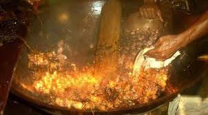 Nam Man Suea Prai Oil Being Made in Cauldron using Herbal Method, for the later immersion of Guru Monk Coins in a later empowerment ceremony